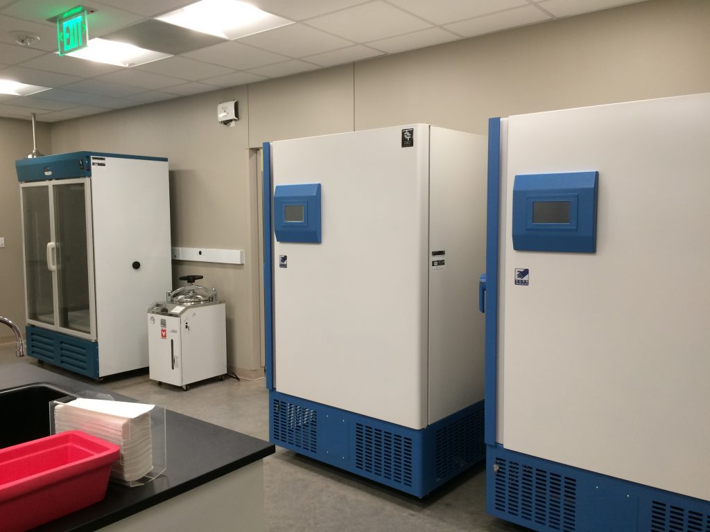 Interior view of the lab showing two large -80C freezers that are part of the BRIT Biorepository.