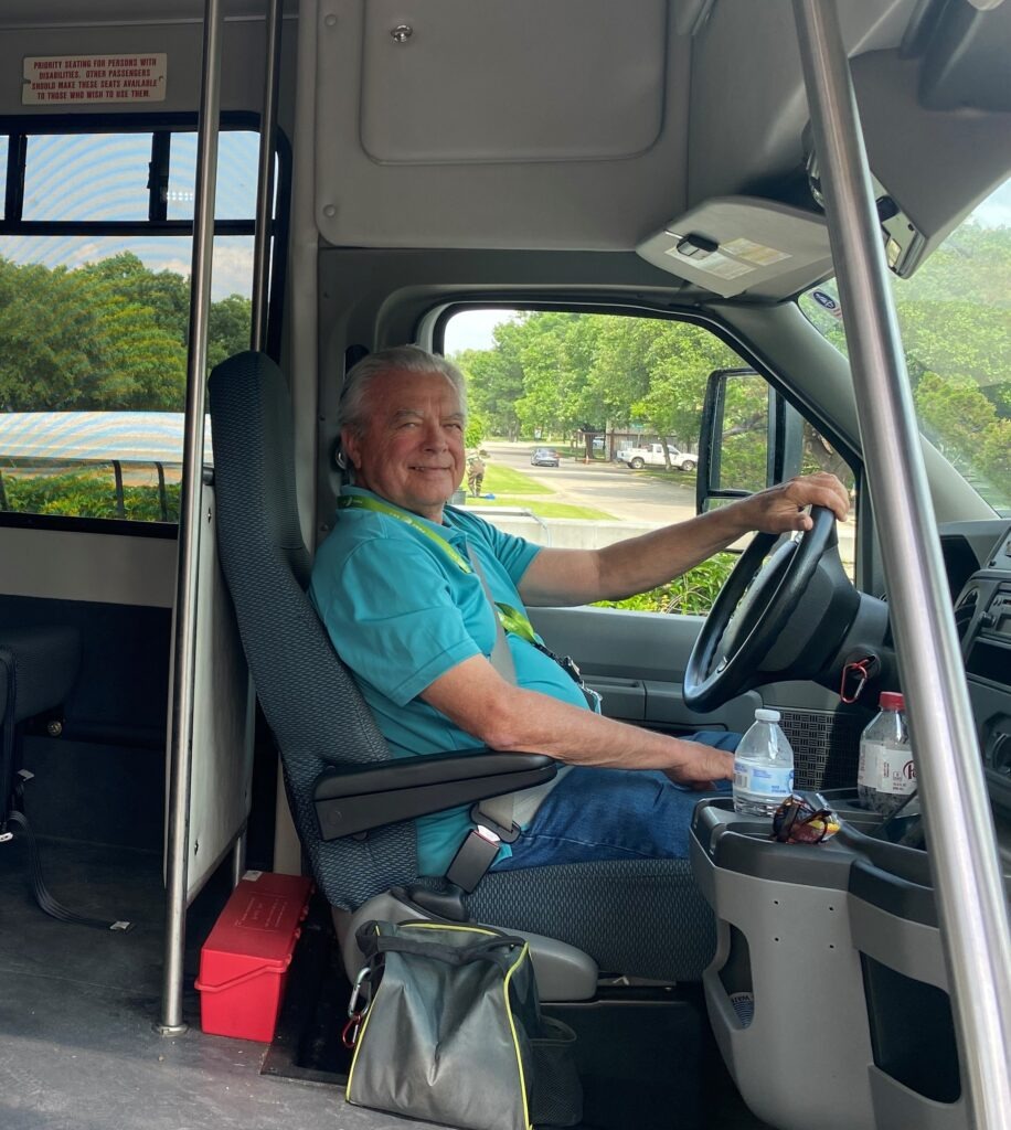 Beauty Bus driver welcomes guests to the free shuttle service