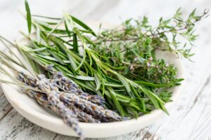 Thyme, rosemary and lavender on a white plate