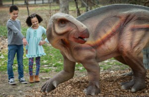 Dinosaur exhibit with kids