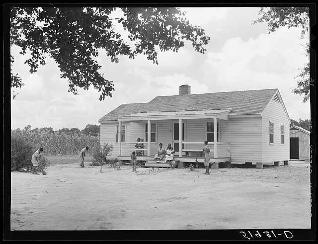 Wolcott, Marion Post, photographer. Children of Frederick Oliver, tenant purchase client, sweeping yard in front of new home. Summerton, South Carolina. Summerton United States South Carolina Clarendon County, 1939. June. Photograph. https://www.loc.gov/item/2017801156/.